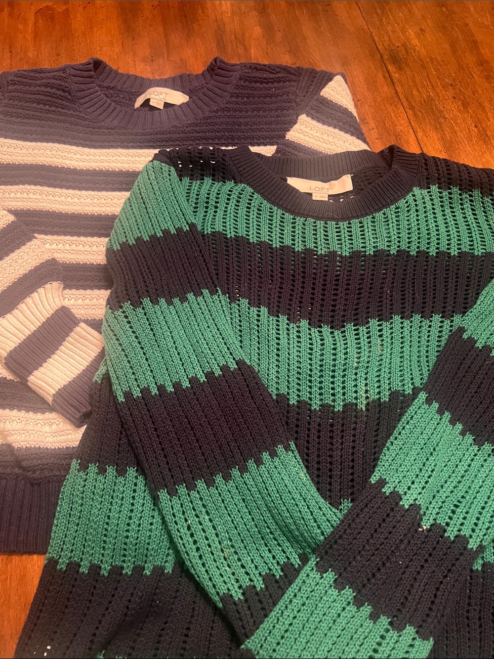 Two LOFT collegiate sweaters in size medium